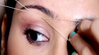 Painless Eyebrow Threading Tutorial At Home Useful Tips  SUPER EASY [upl. by Ahsienor]